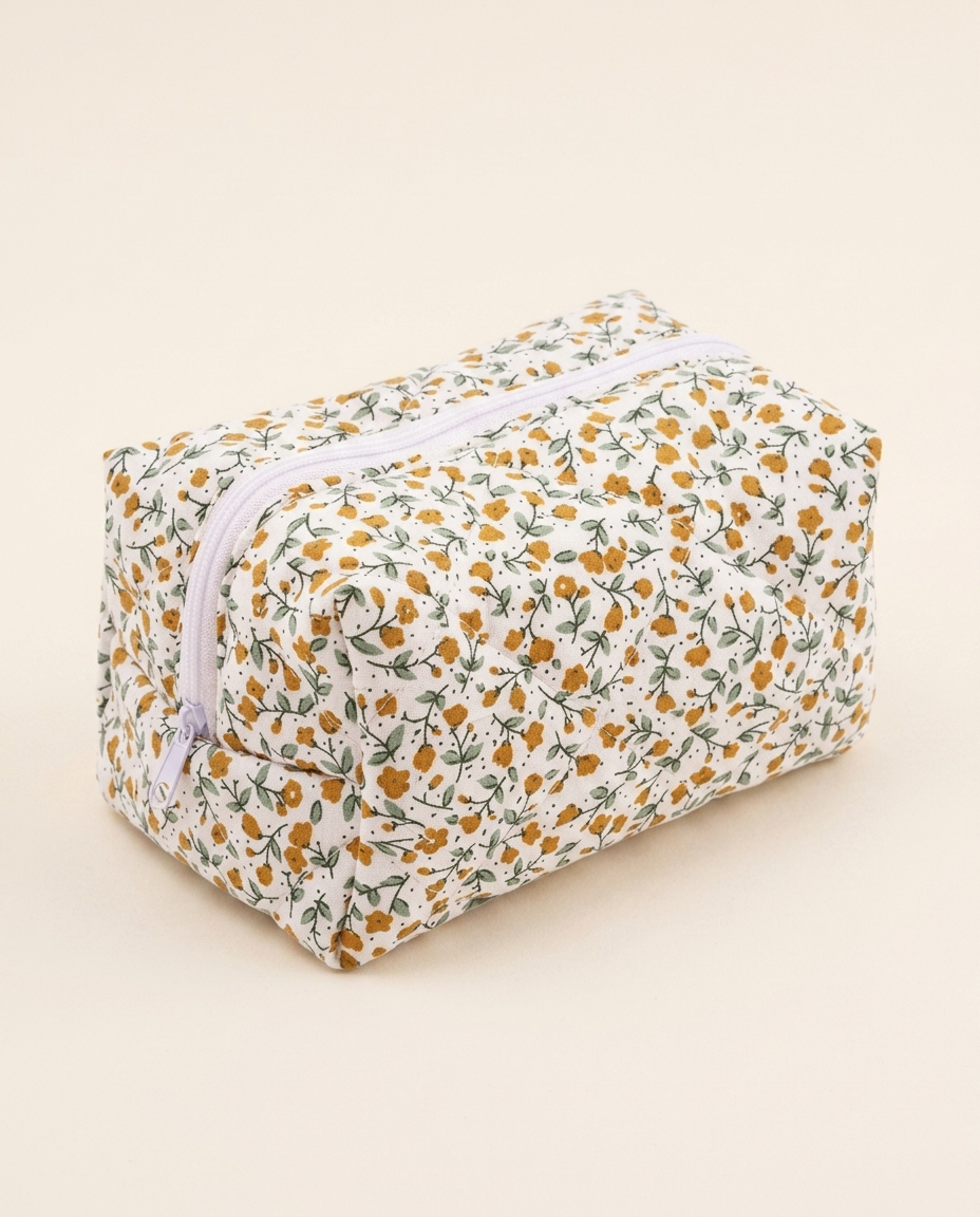 Pouchéa yellow floral quilted makeup bag